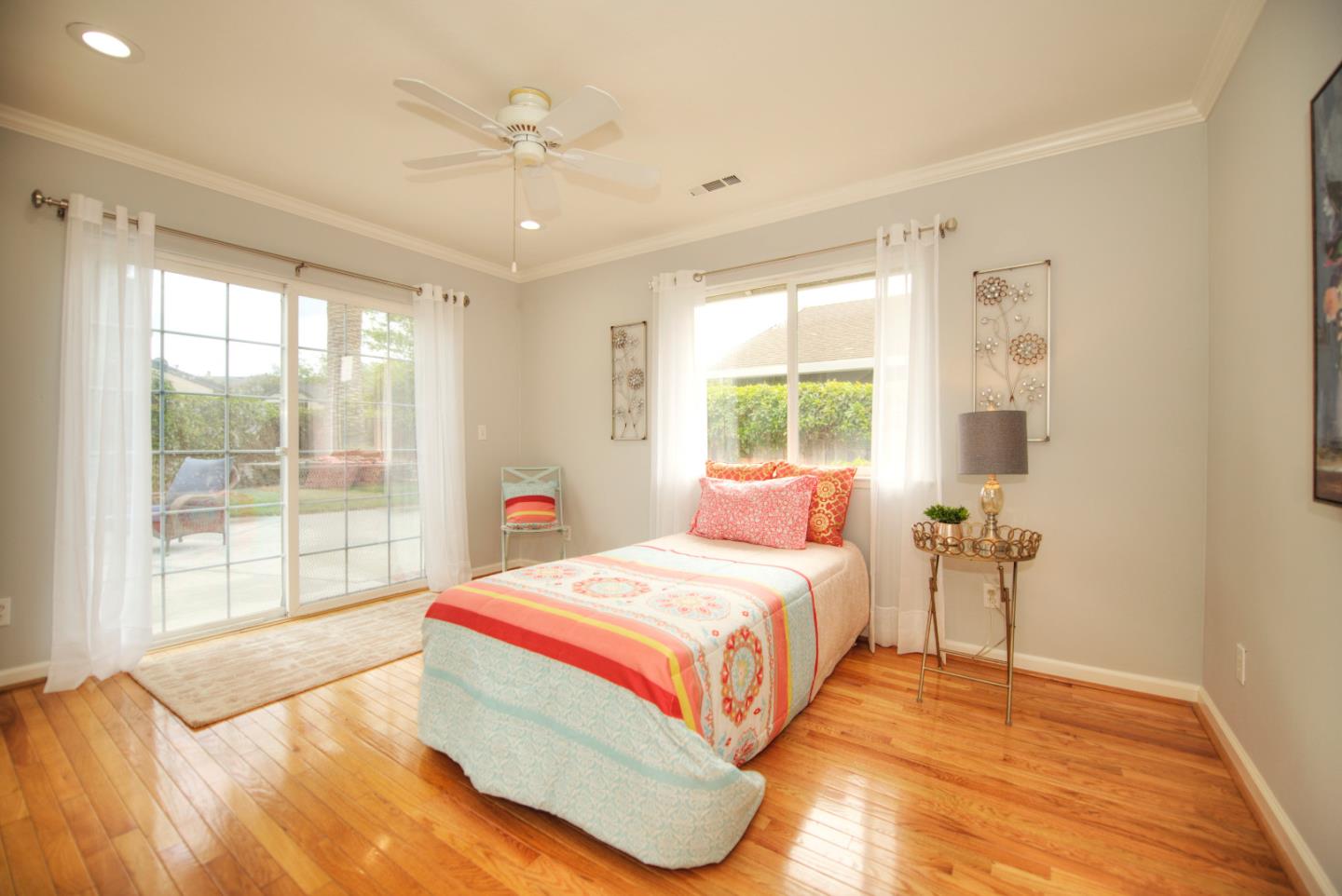 1396 Fallen Leaf Drive Milpitas, CA 95035 - Photo 30 of 43 a bedroom with a bed and a large window