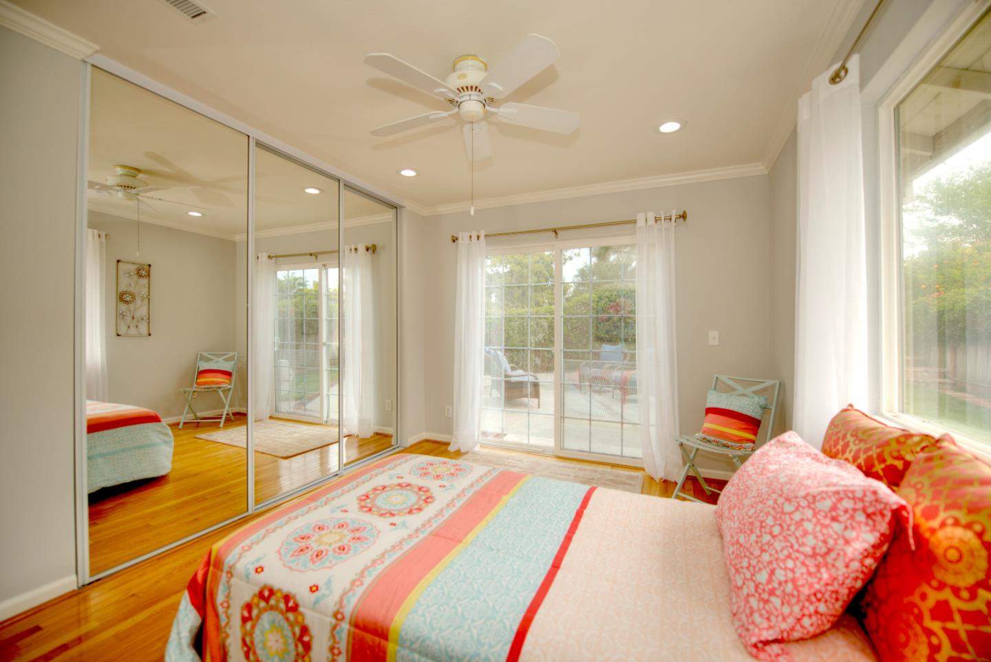 1396 Fallen Leaf Drive Milpitas, CA 95035 - Photo 32 of 43 a bedroom with a bed and a large window with the outer view