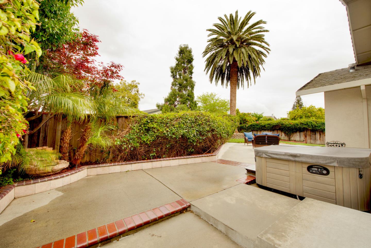 1396 Fallen Leaf Drive Milpitas, CA 95035 - Photo 34 of 43 a view of a terrace with a garden and potted plants