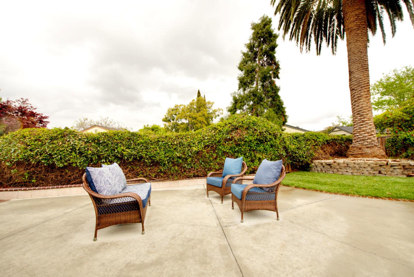 1396 Fallen Leaf Drive Milpitas, CA 95035 - Photo 37 of 43 an outdoor sitting area with a garden
