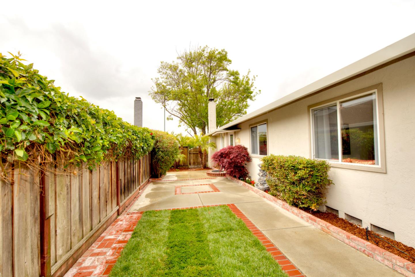 1396 Fallen Leaf Drive Milpitas, CA 95035 - Photo 38 of 43 a view of a house with backyard and porch