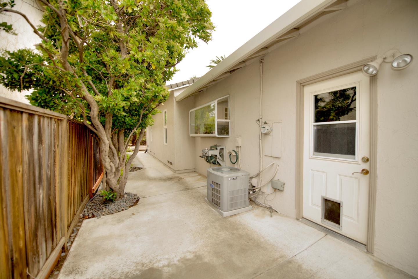 1396 Fallen Leaf Drive Milpitas, CA 95035 - Photo 40 of 43 a view of a patio with table and chairs and potted plants