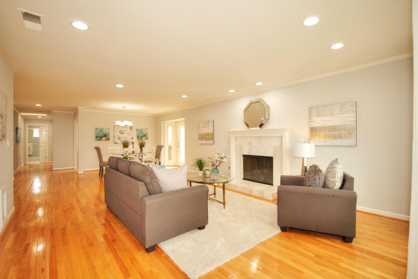 1396 Fallen Leaf Drive Milpitas, CA 95035 - Photo 5 of 43 a living room with furniture and a fireplace