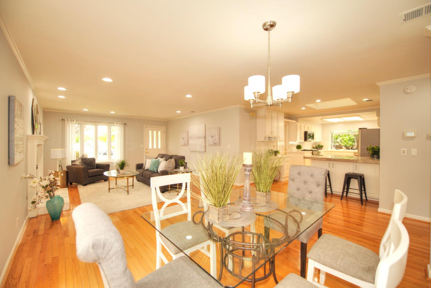 1396 Fallen Leaf Drive Milpitas, CA 95035 - Photo 9 of 43 a view of a dining room with furniture and wooden floor