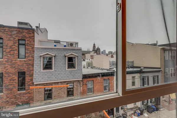 a view of a building from a balcony
