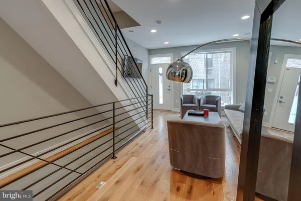 a view of living room with furniture and a window