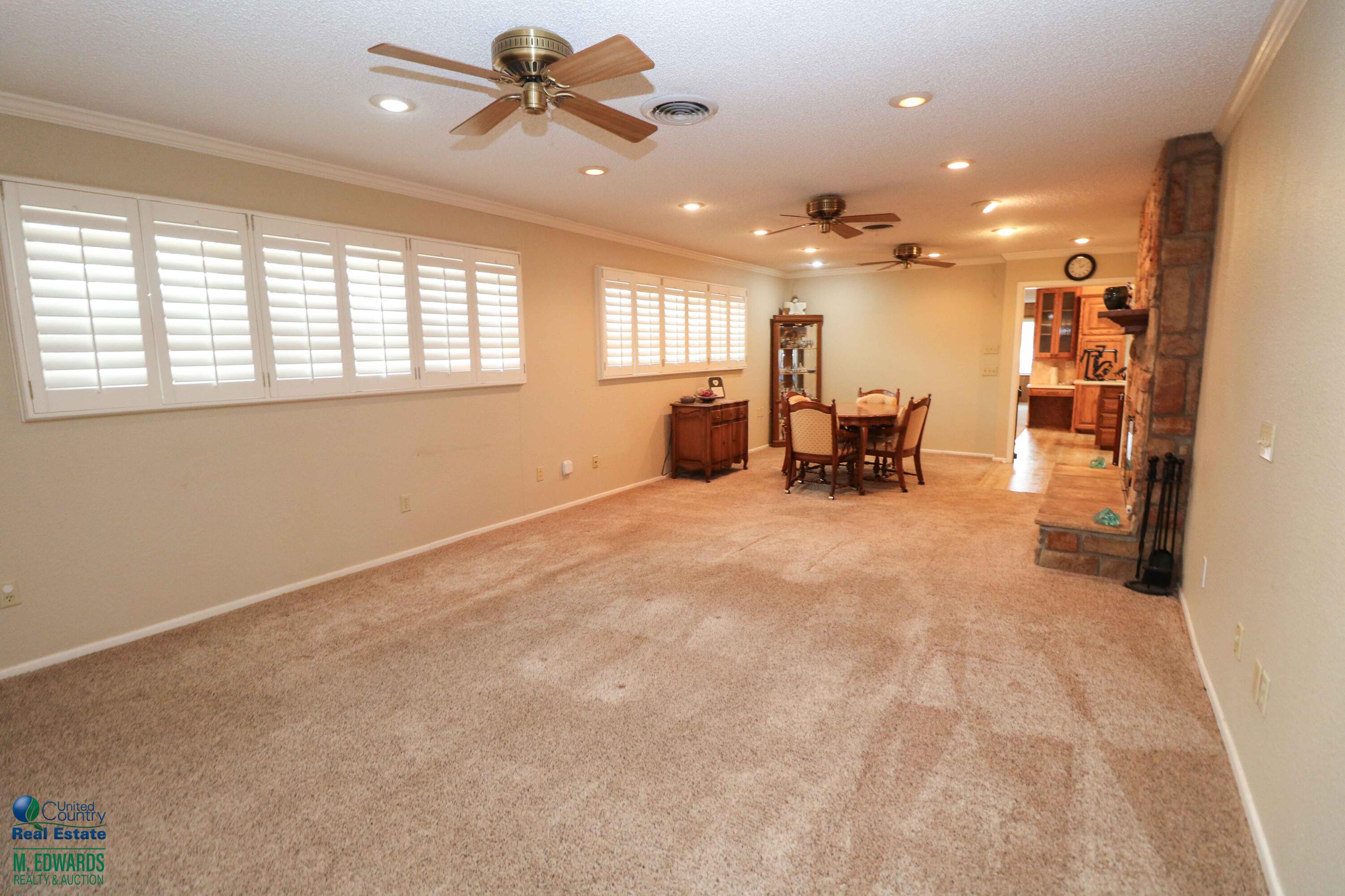 200 Crescent Drive Littlefield, TX 79339 - Photo 11 of 25 an empty room with furniture and windows