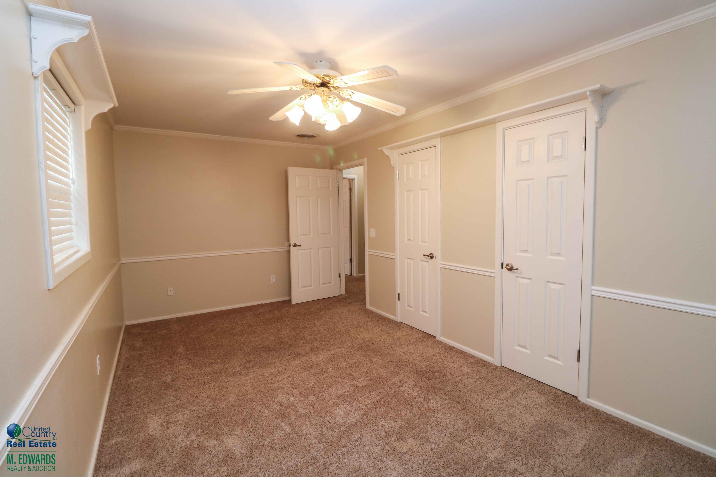200 Crescent Drive Littlefield, TX 79339 - Photo 13 of 25 wooden floor in an empty room
