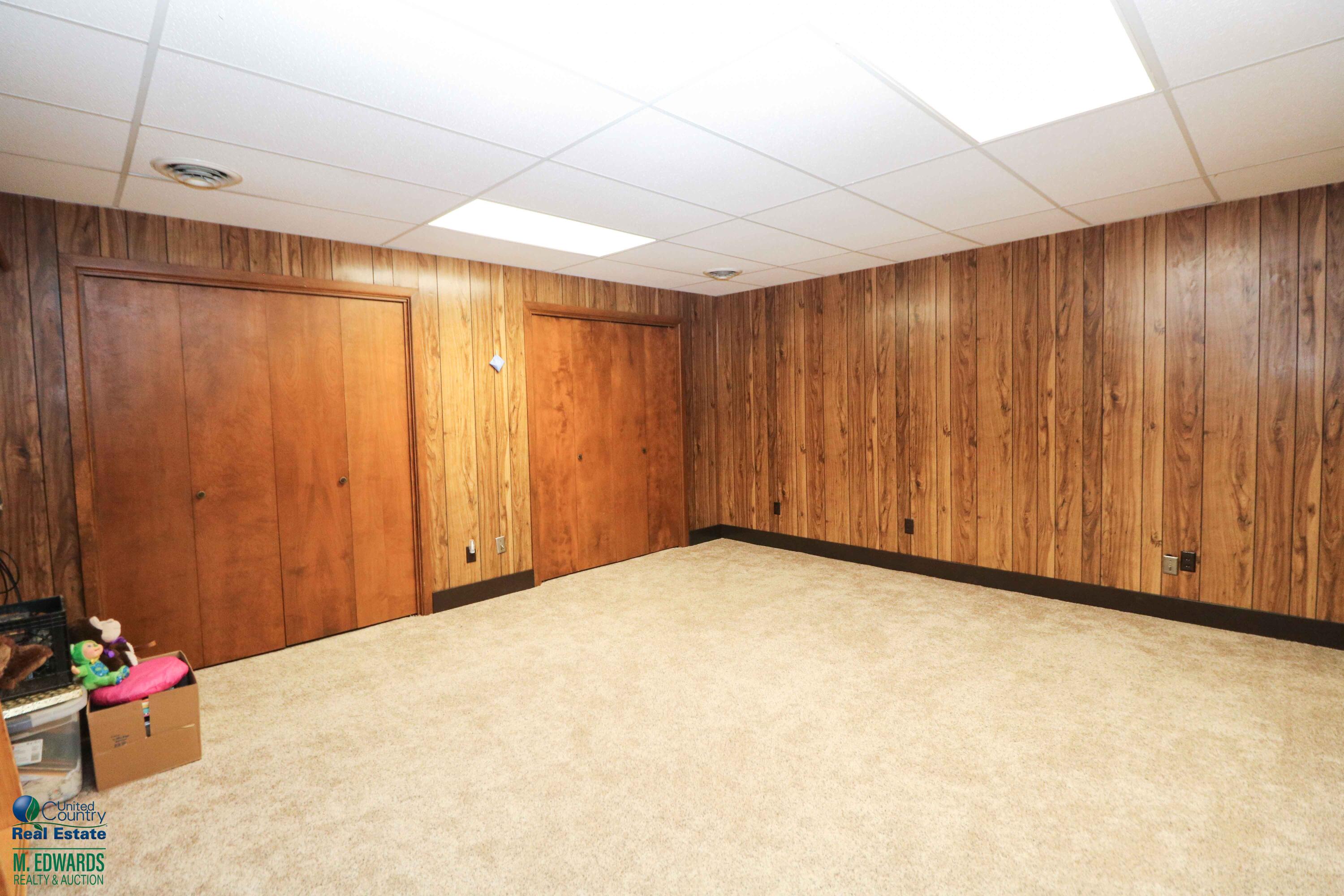 200 Crescent Drive Littlefield, TX 79339 - Photo 21 of 25 a view of an empty room with yellow walls