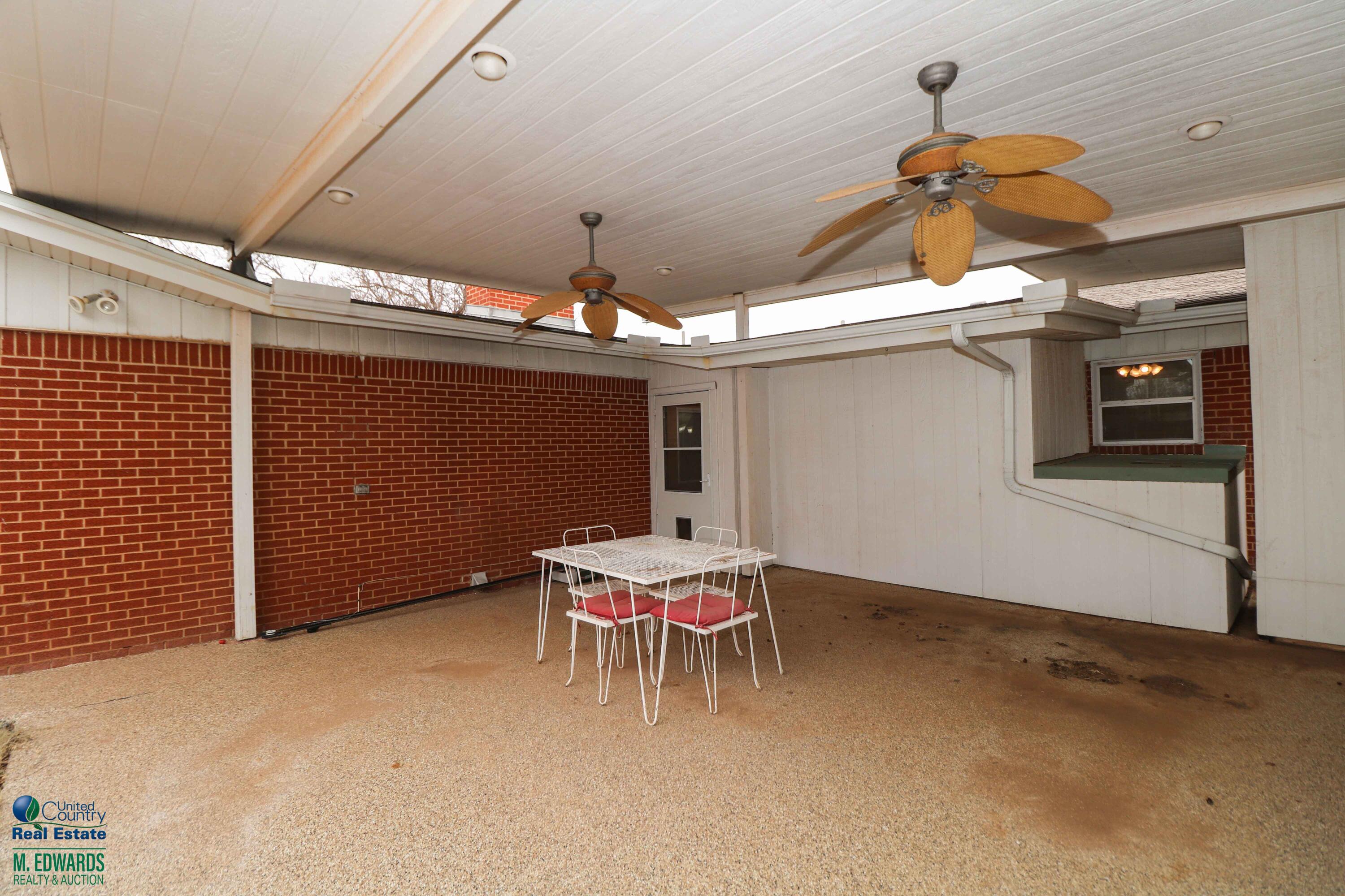 200 Crescent Drive Littlefield, TX 79339 - Photo 24 of 25 a dining room with a table and chairs