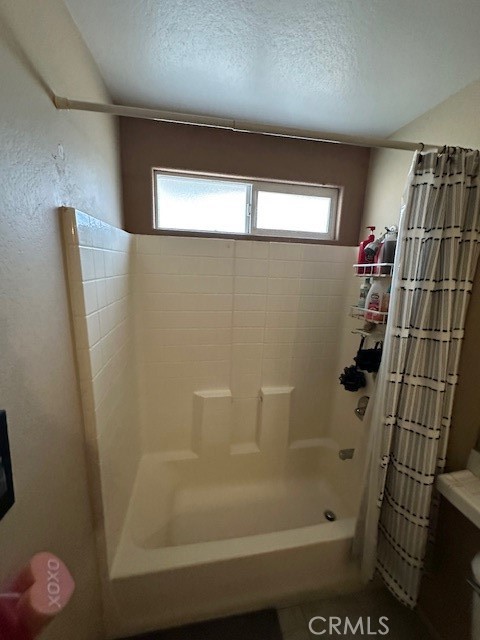 4485 Riverview Drive Riverside, CA 92509 - Photo 24 of 36 a bathroom with a shower