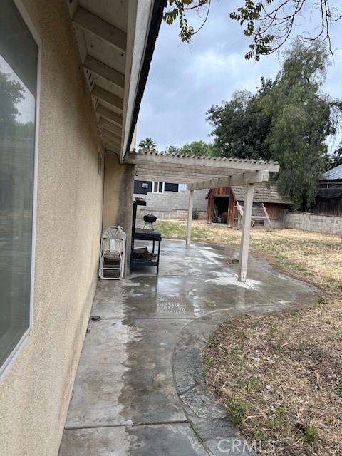 4485 Riverview Drive Riverside, CA 92509 - Photo 27 of 36 a view of a patio with a table and chairs