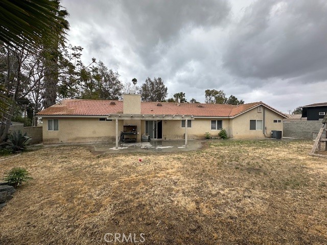 4485 Riverview Drive Riverside, CA 92509 - Photo 29 of 36 a front view of a house with a yard