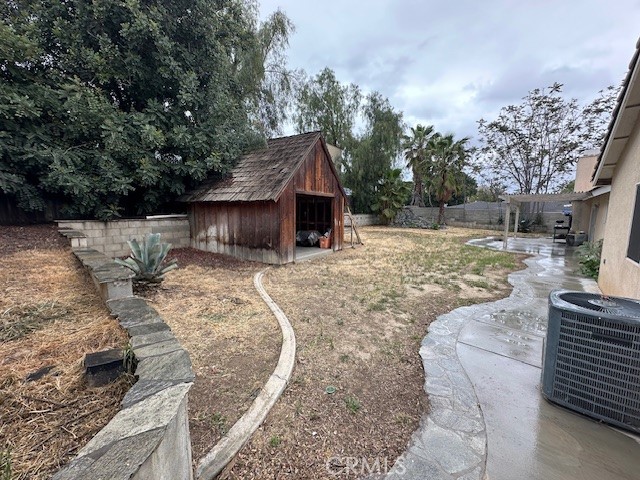 4485 Riverview Drive Riverside, CA 92509 - Photo 31 of 36 a view of a yard with large trees