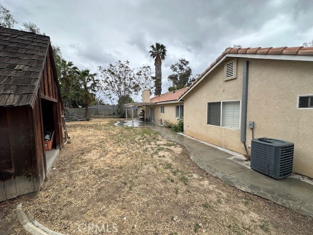 4485 Riverview Drive Riverside, CA 92509 - Photo 33 of 36 a backyard of a house with wooden fence and potted plants