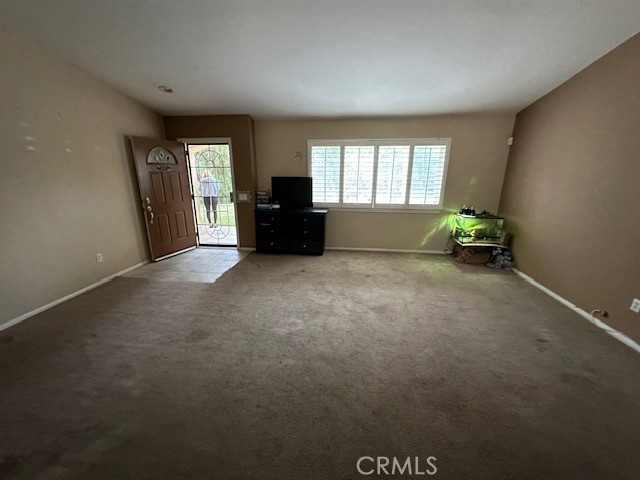 4485 Riverview Drive Riverside, CA 92509 - Photo 6 of 36 an empty room with windows and closet
