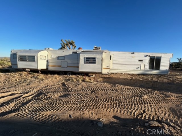 98202 Old Cima Ranch Road Nipton, CA 92364 - Photo 16 of 42 a view of a large building