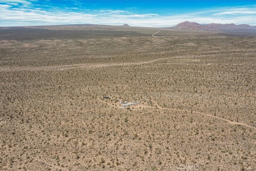 98202 Old Cima Ranch Road Nipton, CA 92364 - Photo 20 of 42 a view of an ocean beach and mountain