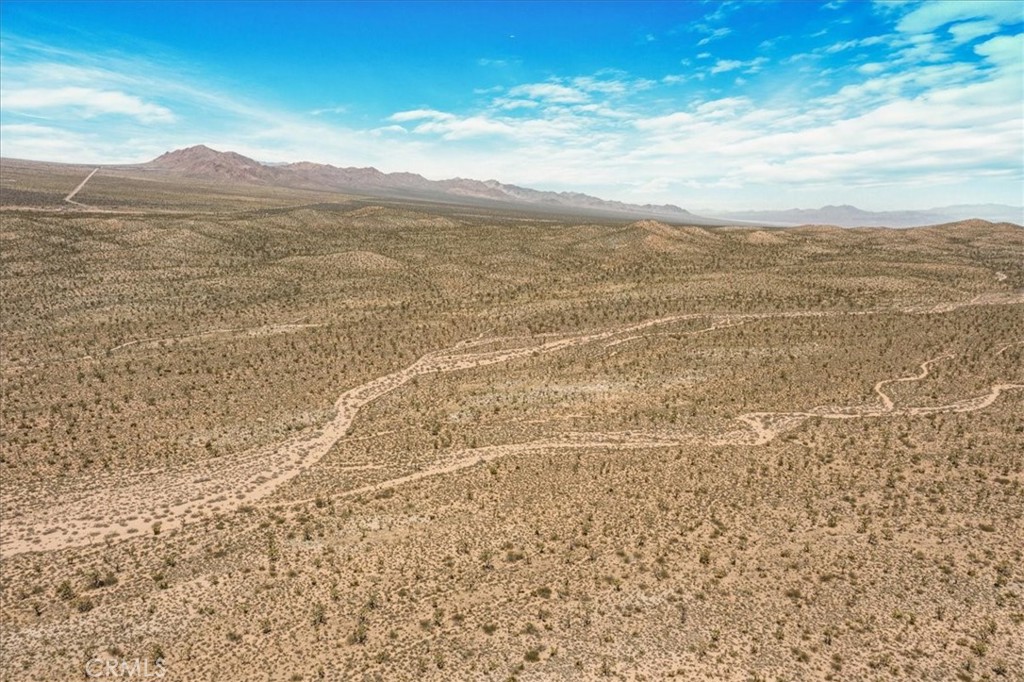 98202 Old Cima Ranch Road Nipton, CA 92364 - Photo 24 of 42 a view of an ocean and a mountain