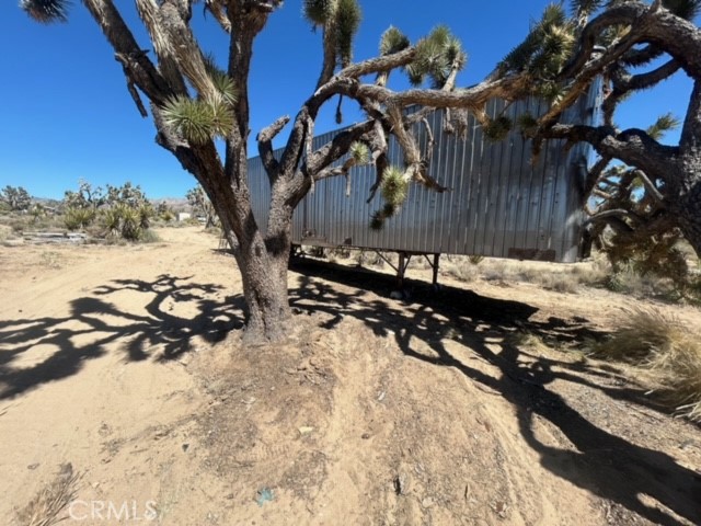 98202 Old Cima Ranch Road Nipton, CA 92364 - Photo 33 of 42 a view of a backyard of the house
