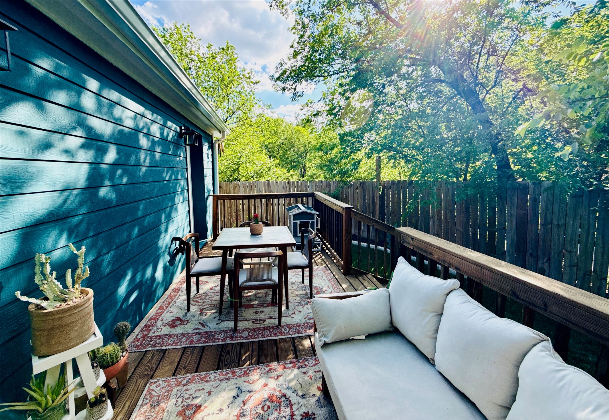1616 Webberville Road, Unit A Austin, TX 78721 - Photo 32 of 35 The property features an outdoor deck with wooden flooring and a wooden railing