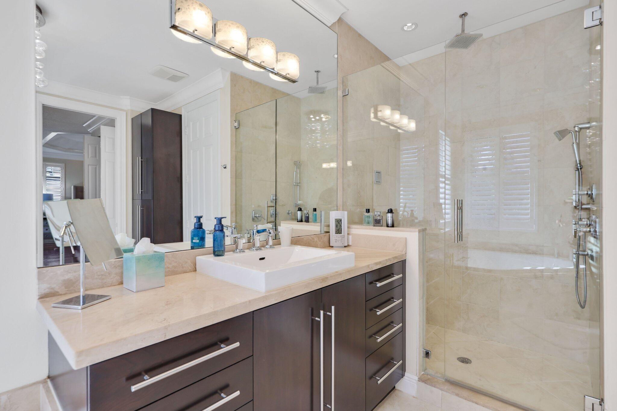 19245 Skyridge Circle Boca Raton, FL 33498 - Photo 58 of 70 a bathroom with a sink double vanity and a mirror