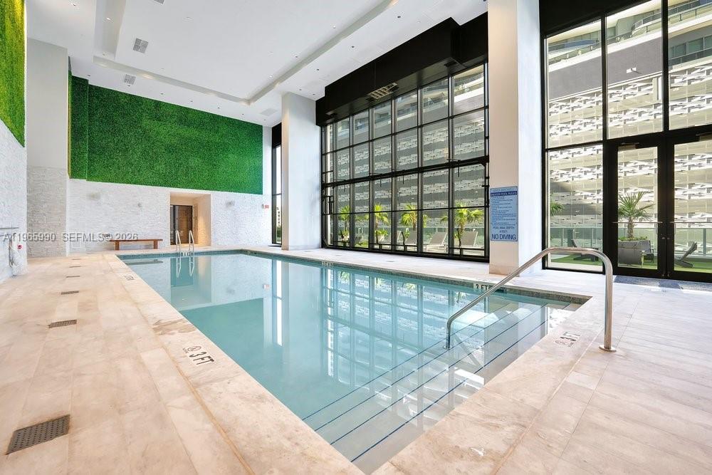 1010 Brickell Avenue, Unit 4011 Miami, FL 33131 - Photo 20 of 32 a view of a living room and a balcony