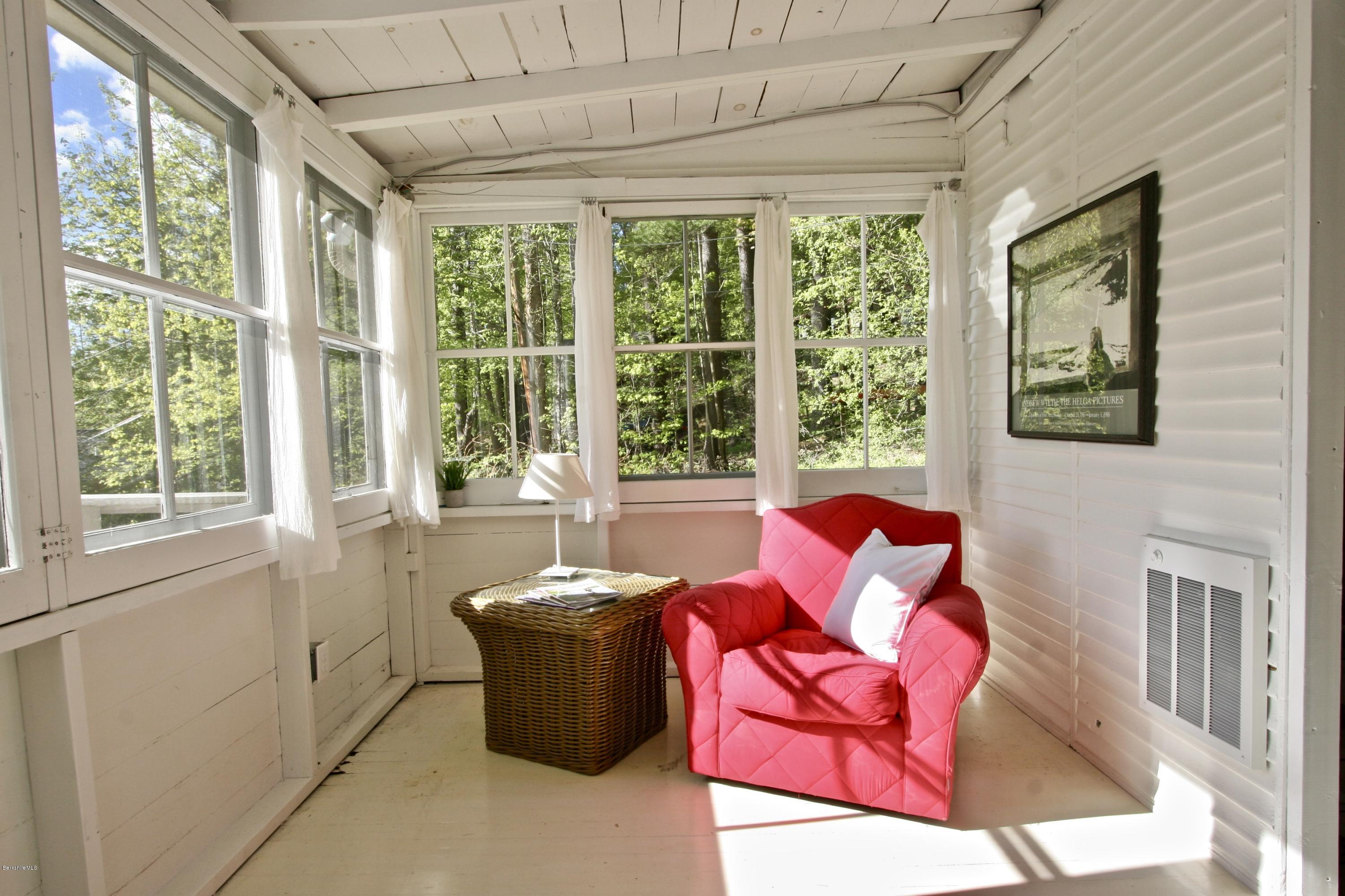22 Mahkeenac Road Stockbridge, MA 01262 - Photo 13 of 24 a living room with furniture and a large window