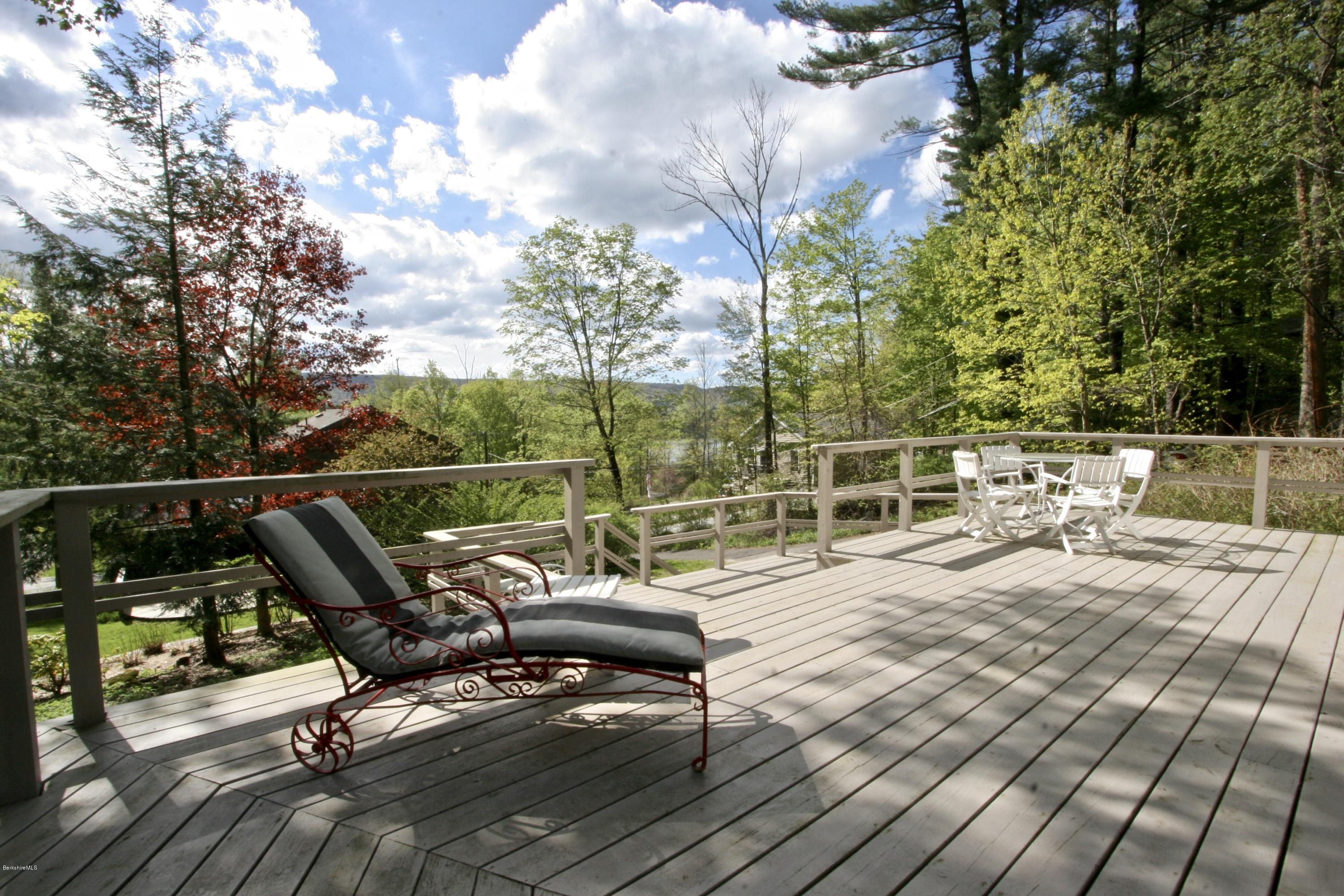 22 Mahkeenac Road Stockbridge, MA 01262 - Photo 20 of 24 a view of a terrace with chairs