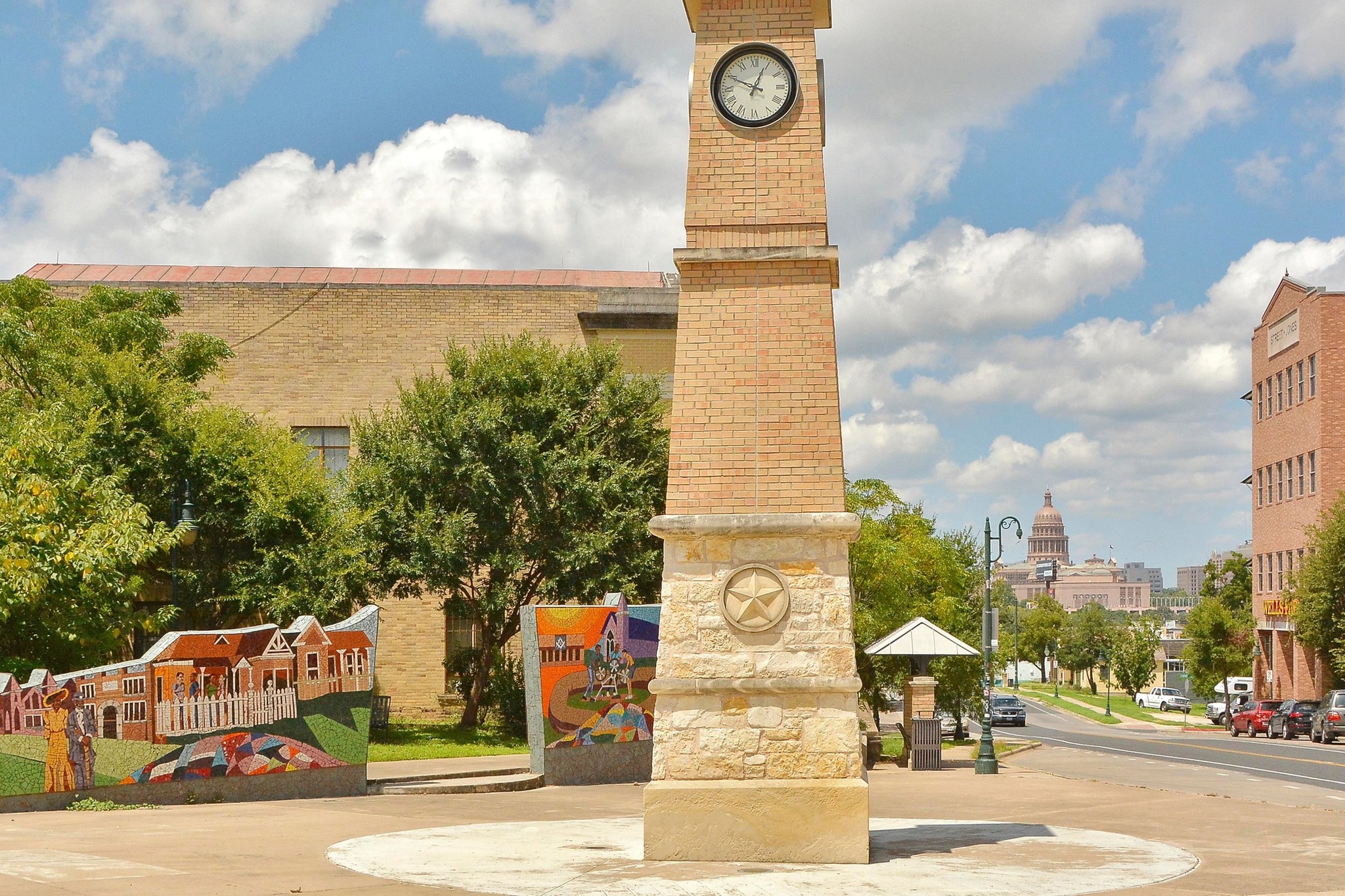 800 Embassy Drive, Unit 602 Austin, TX 78702 - Photo 35 of 37 Brick clock tower with a stone base featuring a star emblem