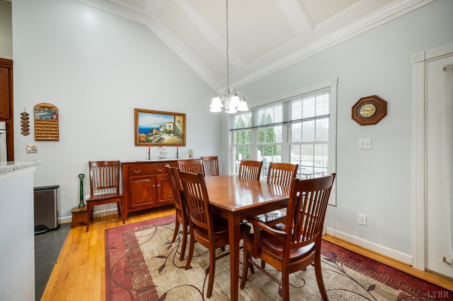 378 Tusculum Lane East Amherst, VA 24521 - Photo 26 of 99 a view of a dining room with furniture window and wooden floor