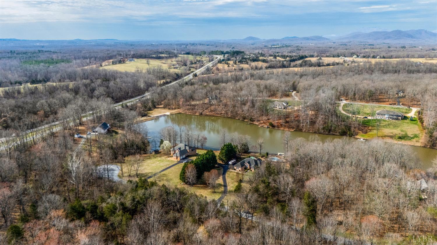 378 Tusculum Lane East Amherst, VA 24521 - Photo 97 of 99 an aerial view of a house with a lake view