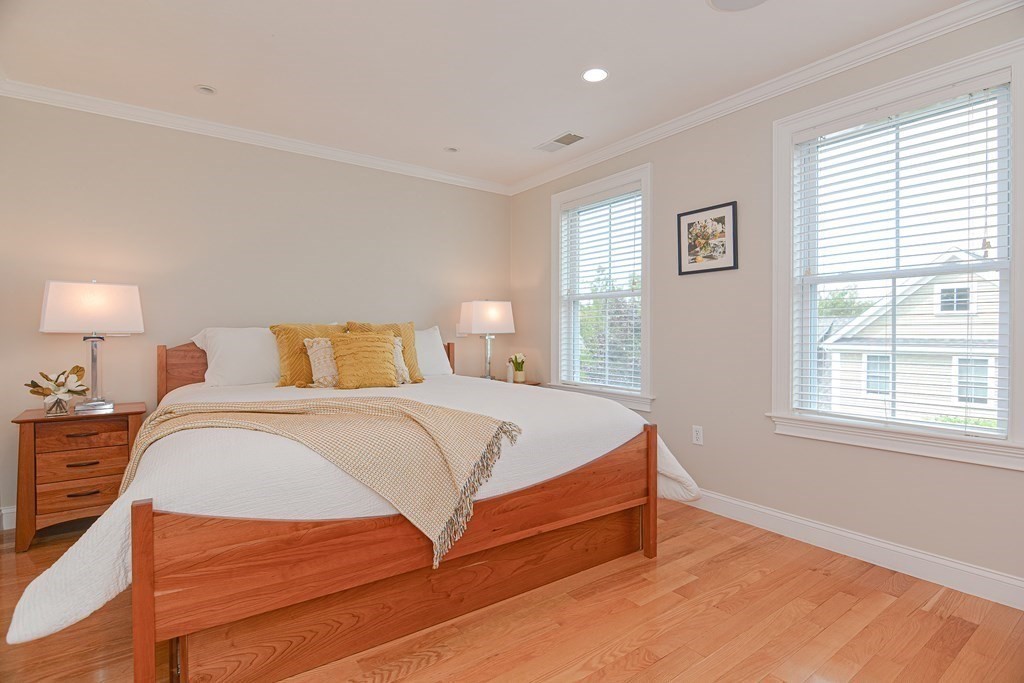 159 Prospect Street, Unit 7 Acton, MA 01720 - Photo 16 of 31 a bedroom with a bed and window
