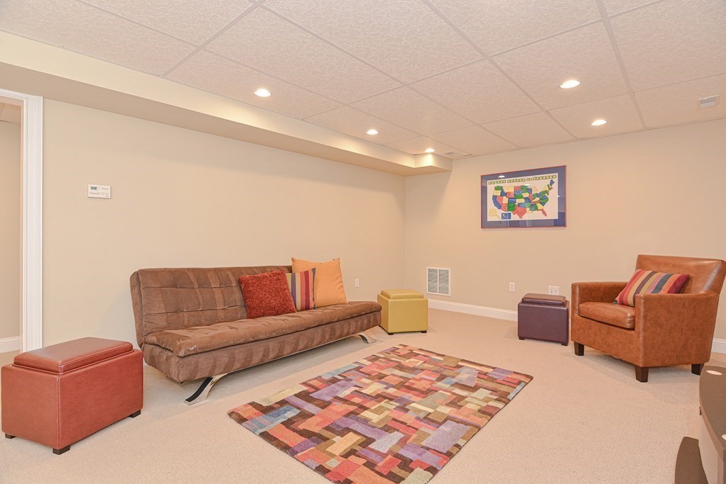159 Prospect Street, Unit 7 Acton, MA 01720 - Photo 24 of 31 a living room with furniture