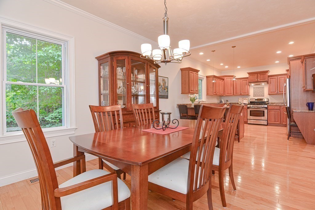 159 Prospect Street, Unit 7 Acton, MA 01720 - Photo 8 of 31 a view of a dining room with furniture window and outside view