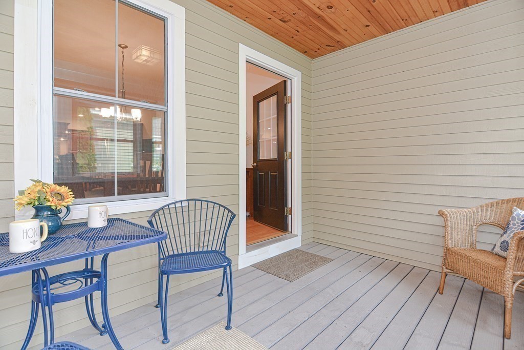 159 Prospect Street, Unit 7 Acton, MA 01720 - Photo 10 of 31 a view of a two chairs in the balcony