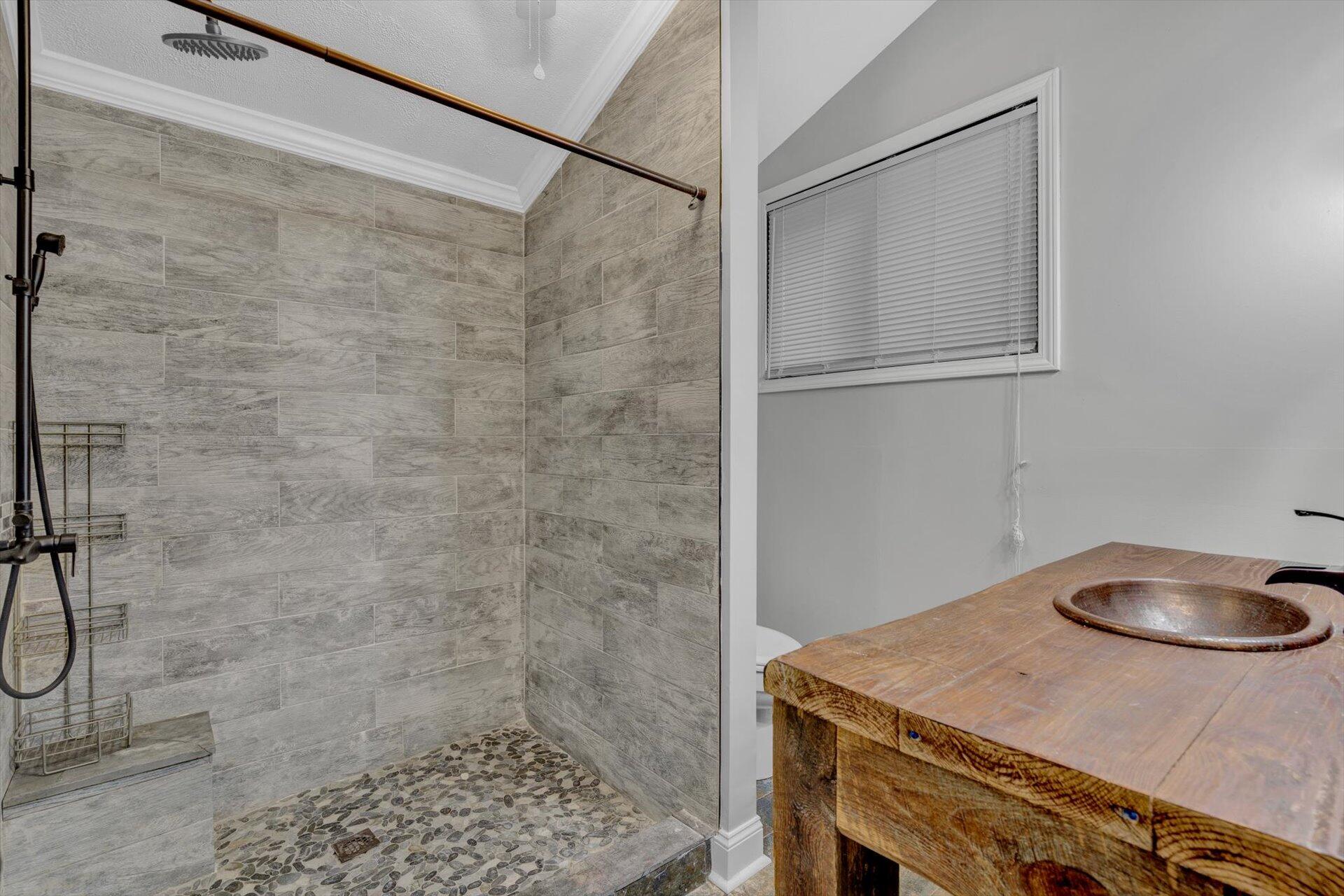 5444 Lakedale Road Southwest Roanoke, VA 24018 - Photo 14 of 33 a bathroom with a sink toilet and a shower