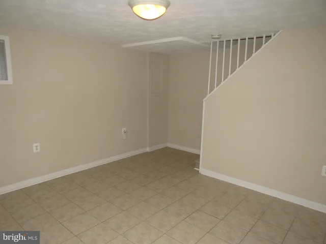 a view of a room with stairs