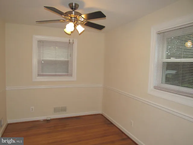 a view of a room that has a window in it