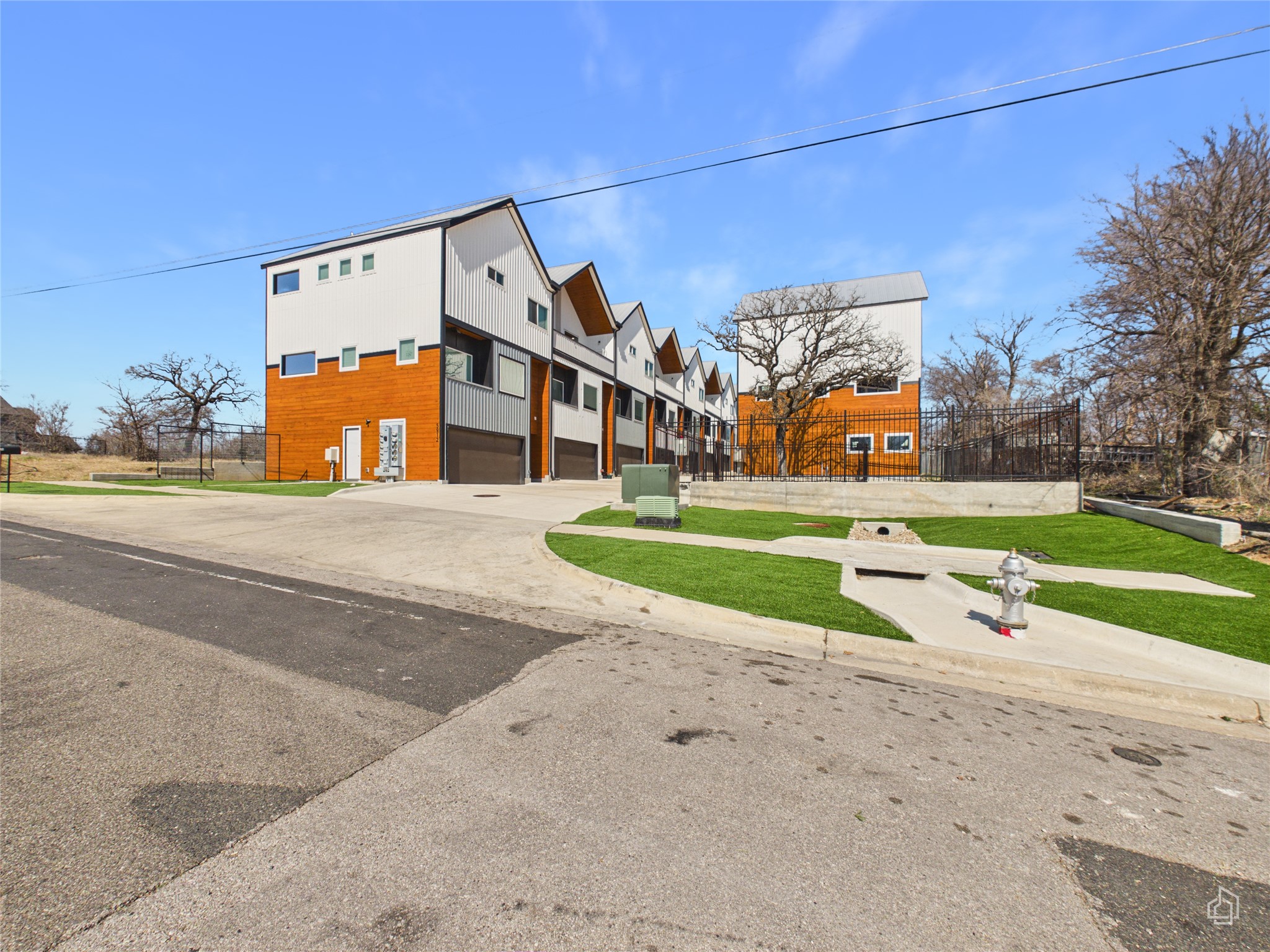 5912 Harold Court, Unit 105 Austin, TX 78721 - Photo 30 of 32 a view of a parked cars in front of a building