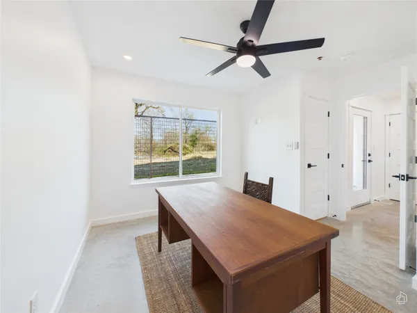a view of an empty room and window