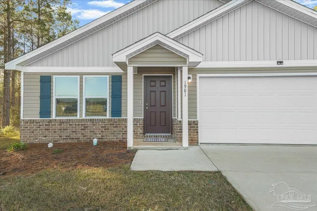 a view of bedroom with wooden floor
