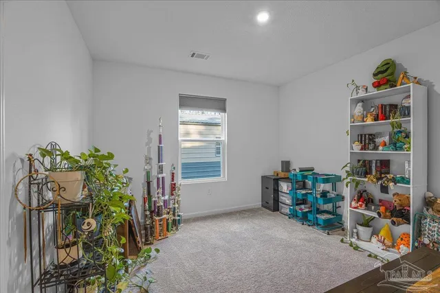 a kitchen with stainless steel appliances a refrigerator a stove a sink dishwasher and a oven with wooden floor