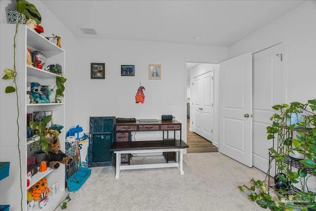 a kitchen with granite countertop a sink and stainless steel appliances