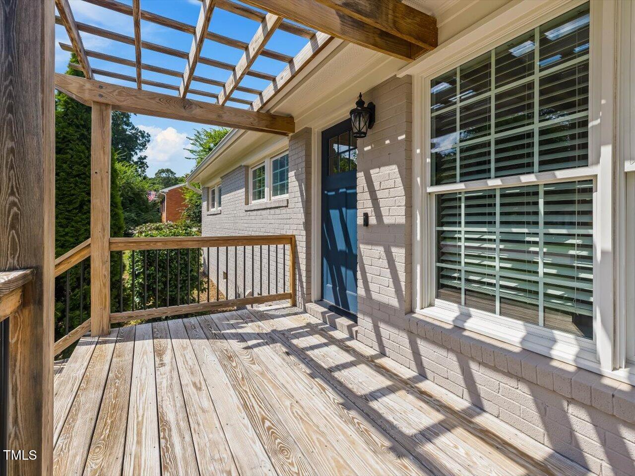 1310 Carolina Pines Avenue Raleigh, NC 27603 - Photo 10 of 53 a view of backyard with a large trees and wooden floor