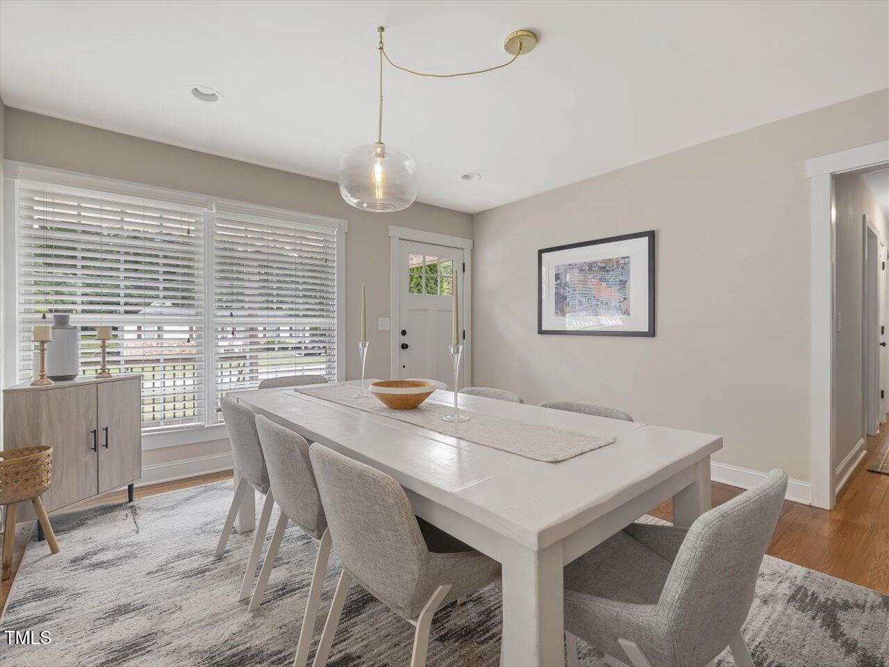 1310 Carolina Pines Avenue Raleigh, NC 27603 - Photo 13 of 53 a view of a dining room with furniture