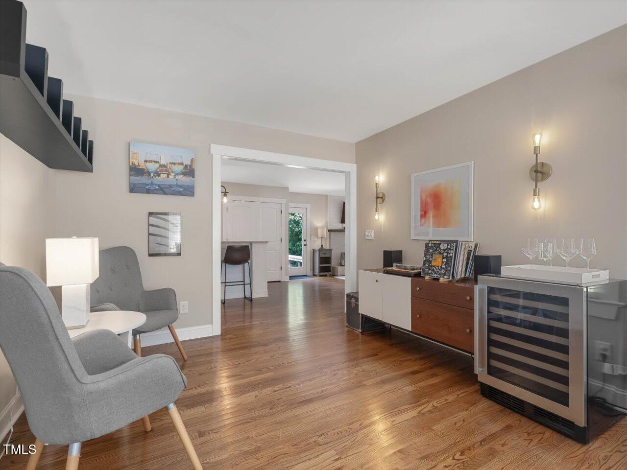 1310 Carolina Pines Avenue Raleigh, NC 27603 - Photo 14 of 53 a living room with fireplace furniture and a wooden floor