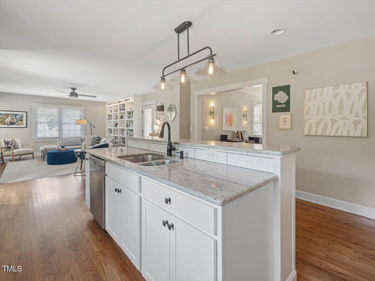 1310 Carolina Pines Avenue Raleigh, NC 27603 - Photo 18 of 53 a kitchen with counter top space sink and center island