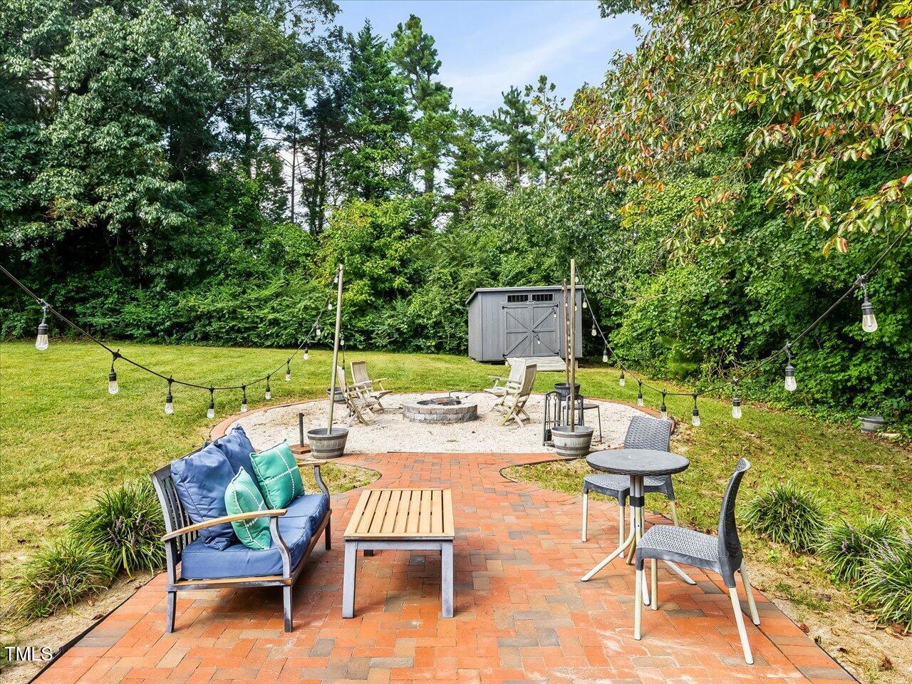 1310 Carolina Pines Avenue Raleigh, NC 27603 - Photo 28 of 53 a view of a chairs and table on the wooden deck