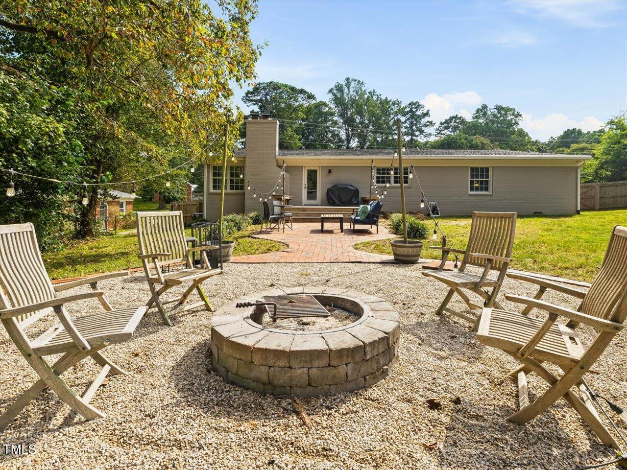 1310 Carolina Pines Avenue Raleigh, NC 27603 - Photo 30 of 53 a view of a swimming pool with a patio